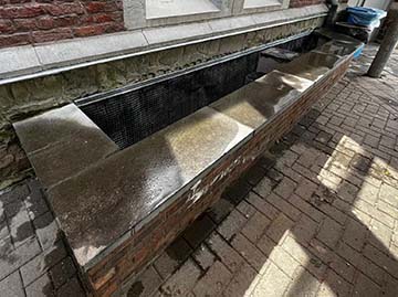 Chambre de visite réhaussée et zinc cintré posé — Herstal